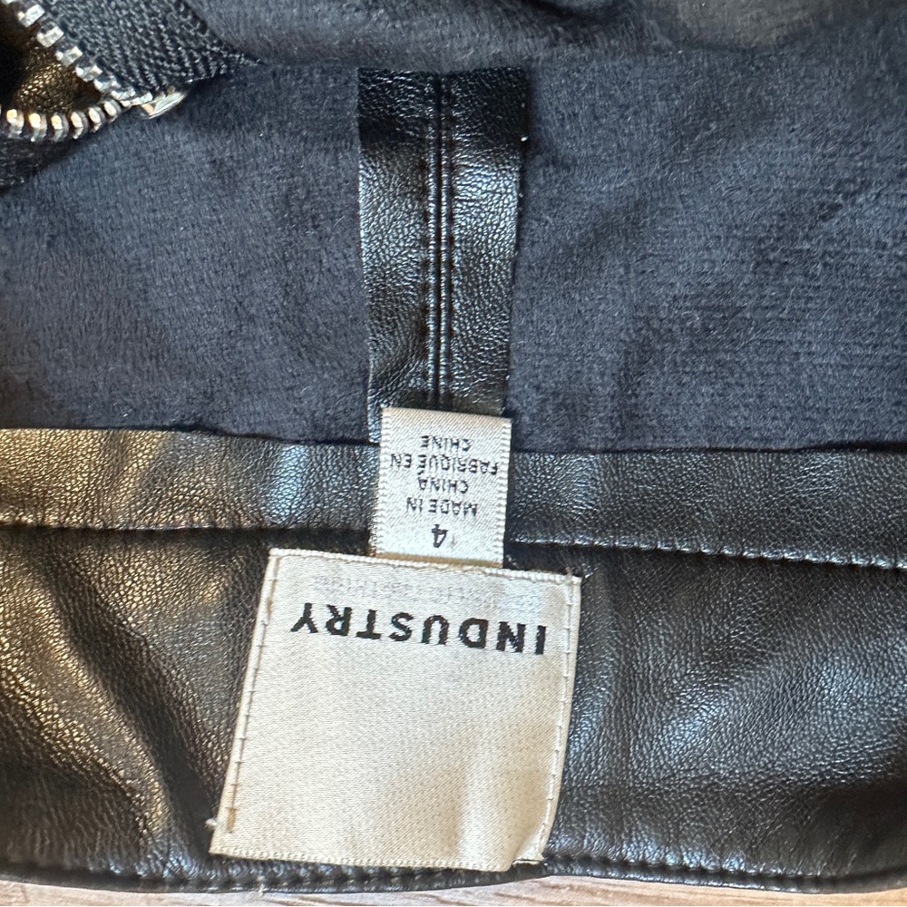 Women's Black Faux Leather Mini Skirt with Asymmetrical Zip Detail - Picture 4 of 5